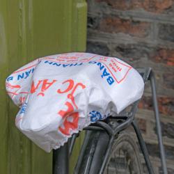 Bike saddle cover, made from recycled bags