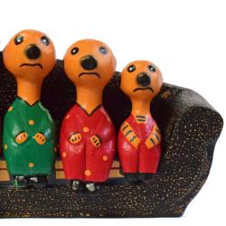 Meerkat family of 5 on sofa hand carved from Albesia wood