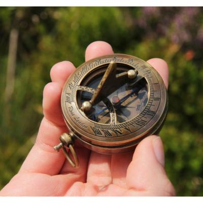 Pocket sundial and compass in brass