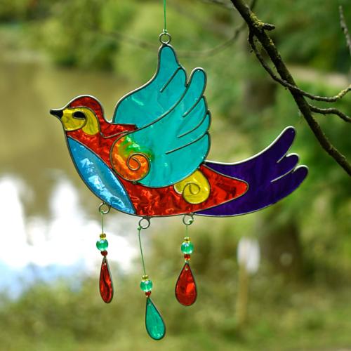 Suncatcher bird flying