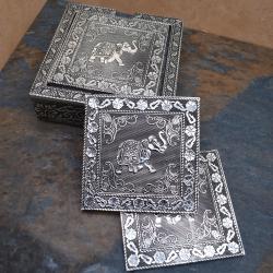 Set of 4 coasters in holder aluminium elephant design