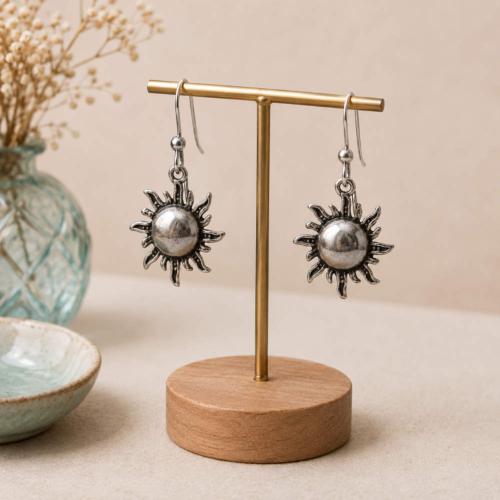 Earrings, silver colour, Sun