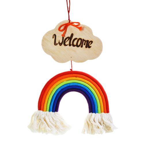 Rainbow hanging with 'Welcome' sign