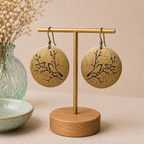 Earrings, Brass round drop engraved with birds on branches 2.5cm diameter