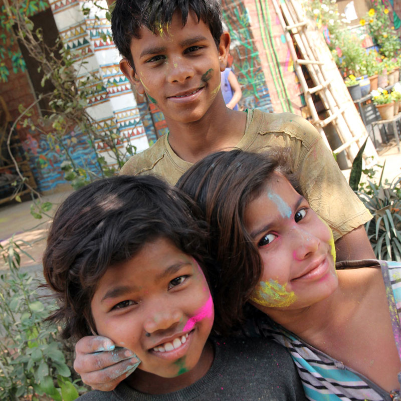 Children have their faces painted as they join in the fun