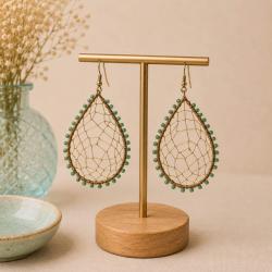 Earrings teardrop gold colour web with green bead edging