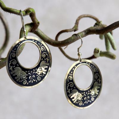 Earrings round black with gold coloured elephants