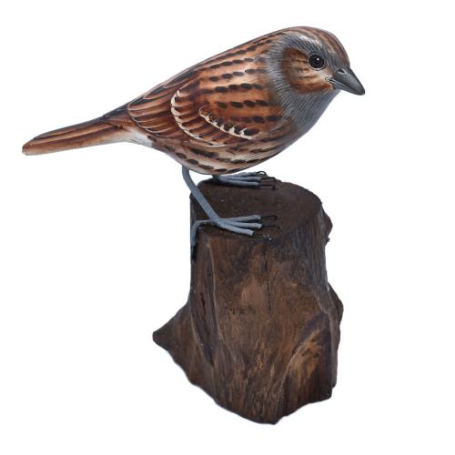 Hedge sparrow on tree trunk, hand carved and painted 8 x 13 x 14cm