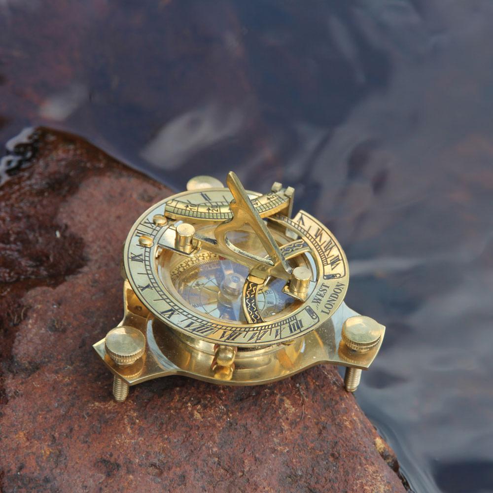 Sundial and compass in brass